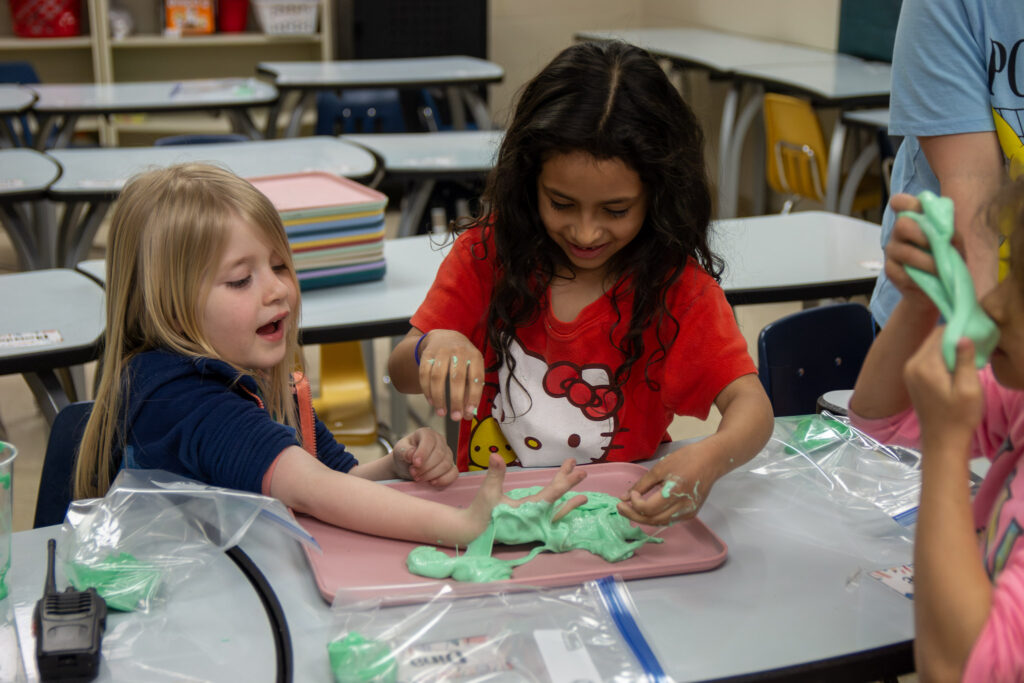 Kids playing with slime they created